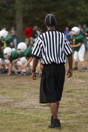 back of referee at youth football gameの写真素材