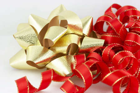 red and gold christmas ribbon and bow sceneの写真素材