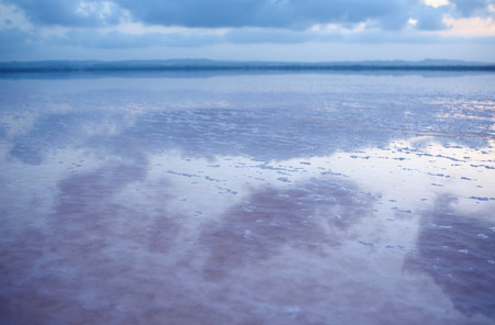 The water looks pink due to a special algae that grows in high levels of salt.の写真素材