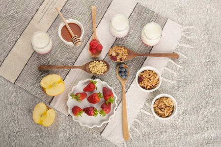 Series about granola, berry and greek yogurt suitable for a healthy breakfast, snack or dessert.の写真素材