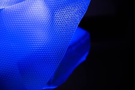 Plastic in blue color. Environmental protection. Utilization of wastes.の写真素材