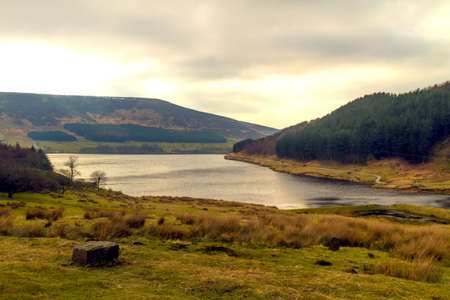 Across the reservoir at dovestone at late afternoonの写真素材