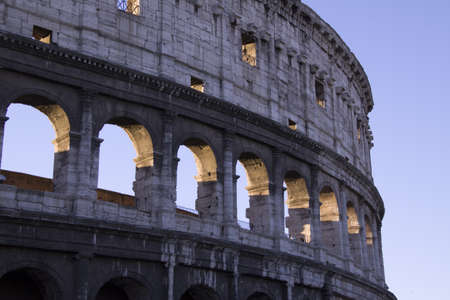 Sun filtering through the arches of the Coloseum, Romeの写真素材