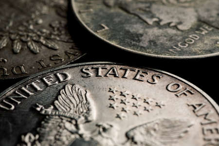 US silver dollars closeup macro shot, selective focus