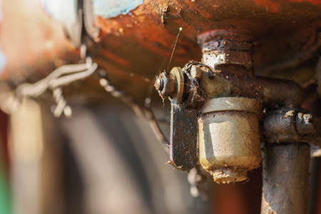 Dirty metal fuel tap, closeup shot selective focusの写真素材