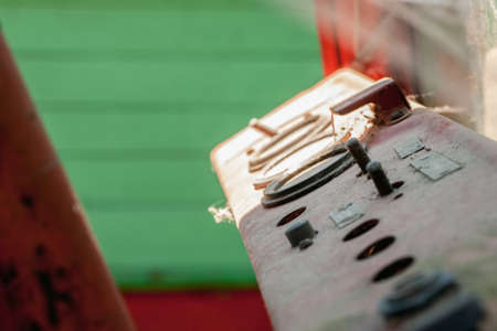 Old rusty dashboard with dust and spider webの写真素材