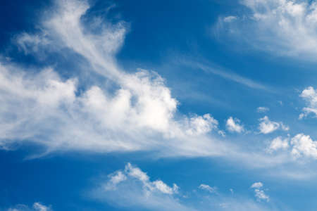 Beautiful blue sky with soft white cloudsの写真素材