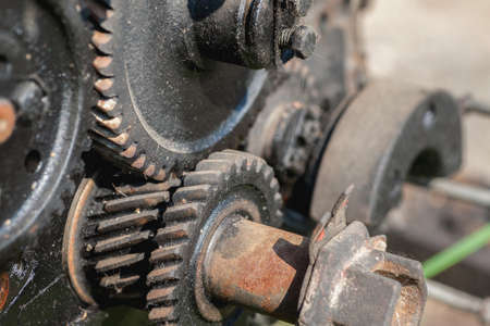 Disassembled mechanism with cogwheels, closeup shot, horizontalの写真素材