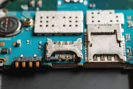 Disassembled digital device close-up macro shot, selective focusの写真素材