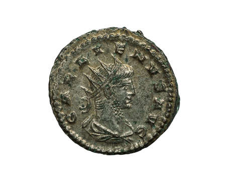 Roman ancient silver coin isolated on white, macro shotの写真素材