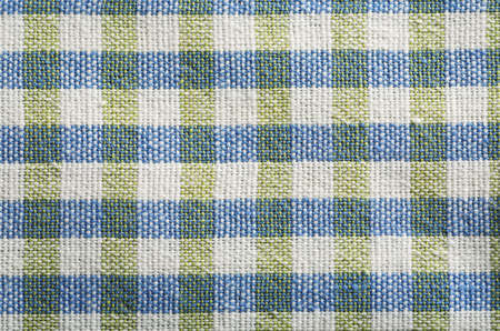 Checkered green-blue napkin flat lay abstract background, macro shotの写真素材