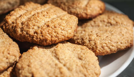 Homemade pile of oatmeal cookies close-up, selective focusの写真素材