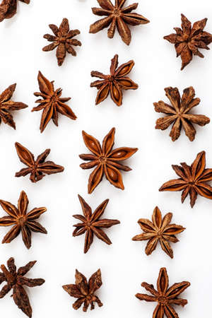Star anise pattern isolated on white, flat lay, top view, verticalの写真素材