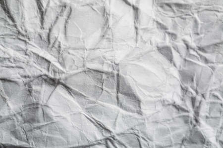 Wrinkled white paper texture closeup shot, macro.の写真素材
