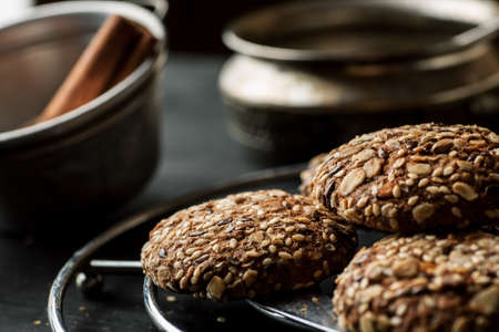 Oatmeal cookies on a metal stand closeup shot.の写真素材