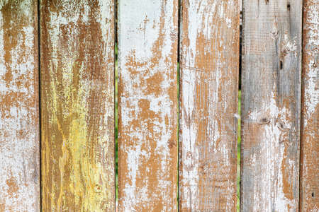 Part of an old wooden fence with weathered planks, abstract textureの写真素材