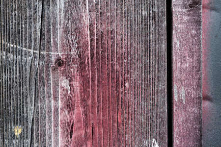 Fragment of old wood with some paint on itの写真素材