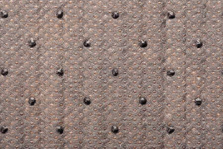 Abstract texture of an piece of fabric with black dots