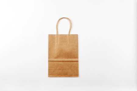Paper bag with handles on a white background top viewの写真素材