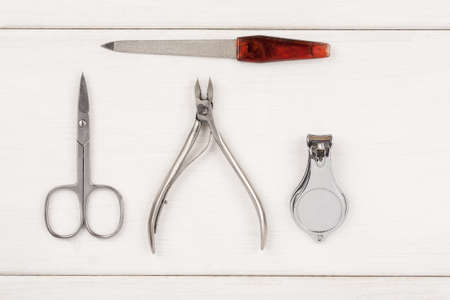 Nail care items on a white table top viewの写真素材