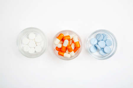 Medications and pills on a white background closeup shotの写真素材