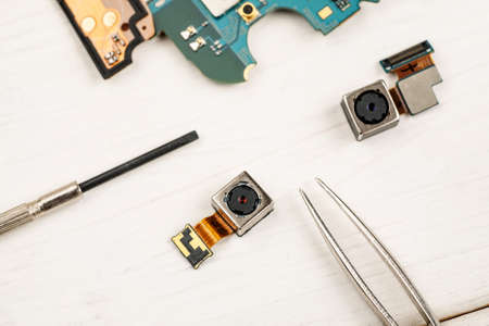 Smartphone camera modules on a white background, closeupの写真素材