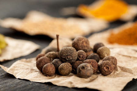 Allspice on a piece of paper macro shotの写真素材