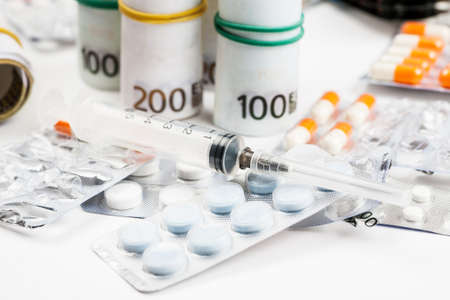 Medications and pills on a white background closeup shot