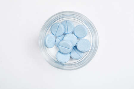 Medications and pills on a white background closeup shotの写真素材