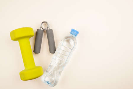 Sports equipment with bottle of water on a white background top viewの写真素材