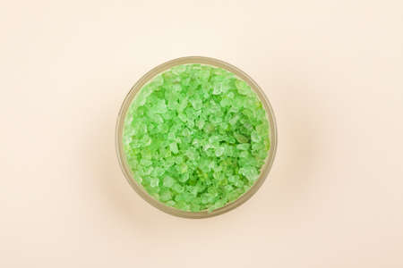 Green sea salt in glass container top viewの写真素材