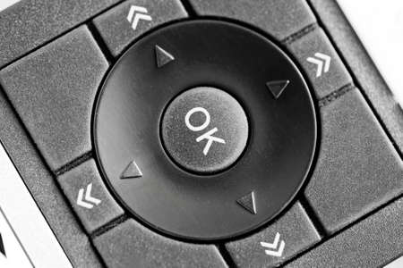 OK button closeup shot, remote control macro top viewの写真素材