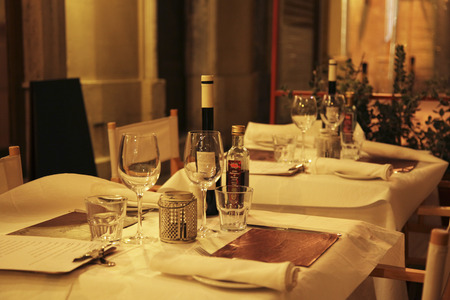 Table set for a dinner in a street restaurantのeditorial素材