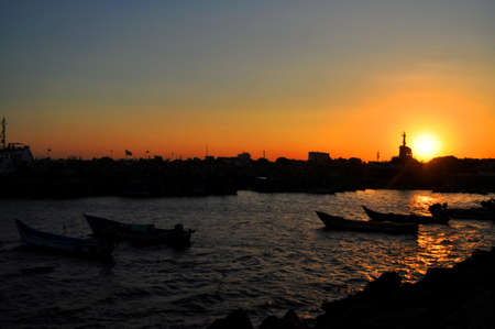 Sunset at a harbour in chennai indiaの写真素材