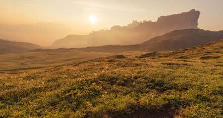 Mountain Panorama of the Dolomites as viewed from passo di Giau (as viewed from the mountain pass Giau). Photograph was taken just after the sunrise from the top of the pass.の写真素材