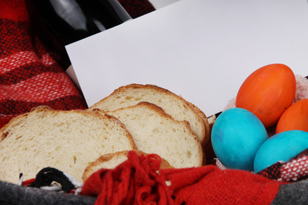 Easter. Easter table. Isolated ester composition with easter eggs, vine, bread and envelope with text.の写真素材