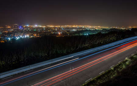 Blue and red city trail lightsの写真素材