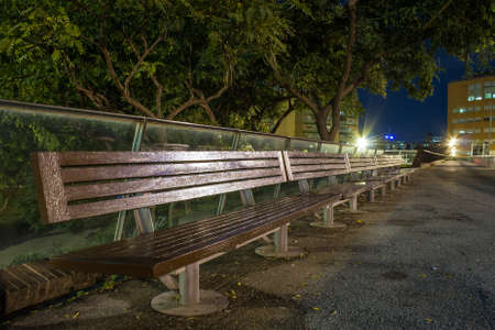 Long bench in the nightの写真素材