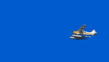Photo of seaplane with blue sky as background