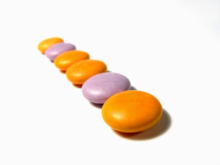 Close-up photo of brown sweets (isolation with shadows)