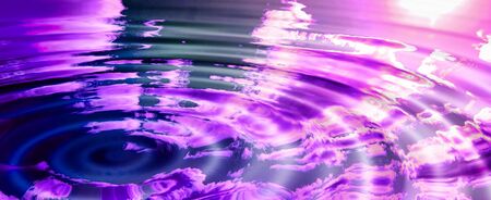 An artificially created abstrack rippled pink world の写真素材