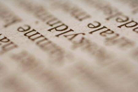 A macro photo of text in an old bookの写真素材