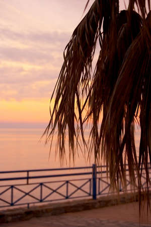 A photo of a  ocean sunset seen from a luxury villa in Spainの写真素材