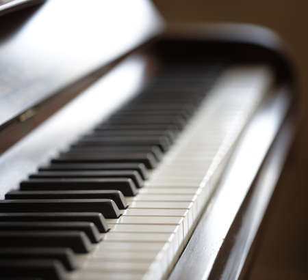 A photo of an old piano - close up の写真素材