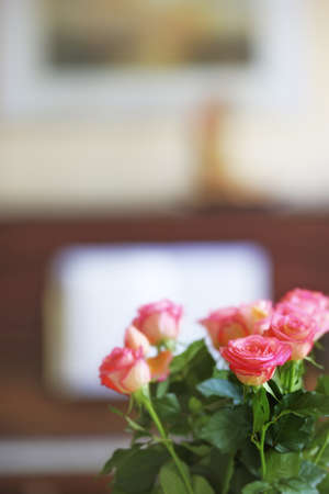 A photo of the beauty of roses in the piano roomの写真素材