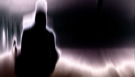 A motion blurred image of a Man and backgroundの写真素材