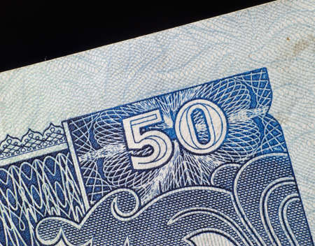 A macro photo of Nepal 50 Rupi