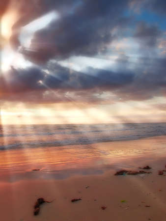 A photo of tropical beach sunsetの写真素材