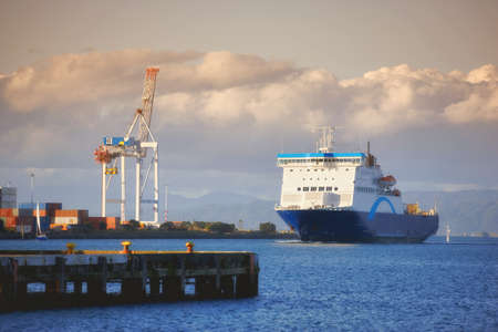 A photo of a huge commercial boat and ferryの写真素材