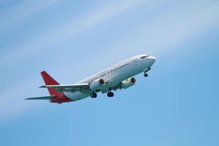 A telephoto of an airplane flying